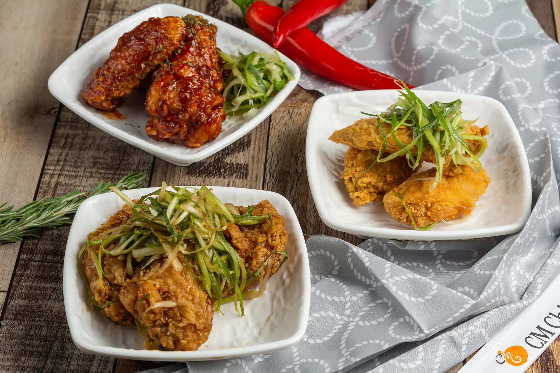 An assortment of korean fried chicken flavors from choongman chicken